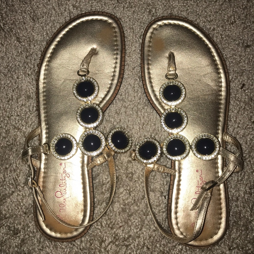 Gold and navy sandals